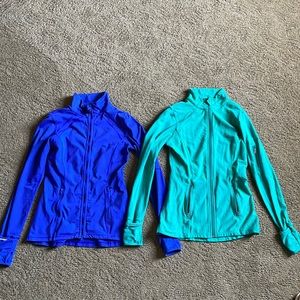 Athletic zip ups. Sold together size small.